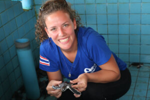 Emily getting hands on at the Royal Thai Navy's Sea Turtle Nursery. A conservation centre for the care and rehabilitation of local Sea Turtles.